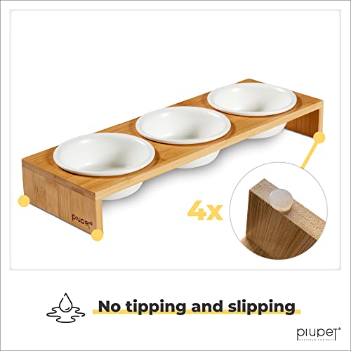 PiuPet® Cat Bowls for Indoor Cats 8.5 fl oz with Rack, Set of 3 Bowls for Cats and Small Dogs, White Ceramic Cat Bowls with Stylish and Non-Slip Bamboo Frame I Ergonomic Kitten Bowls for Easy Cleaning